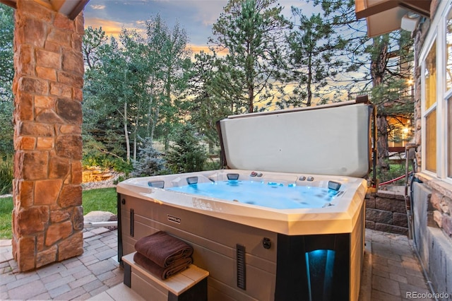 24906 E Geddes Cir, Aurora, CO 80016 - patio terrace at dusk with a hot tub and a patio area