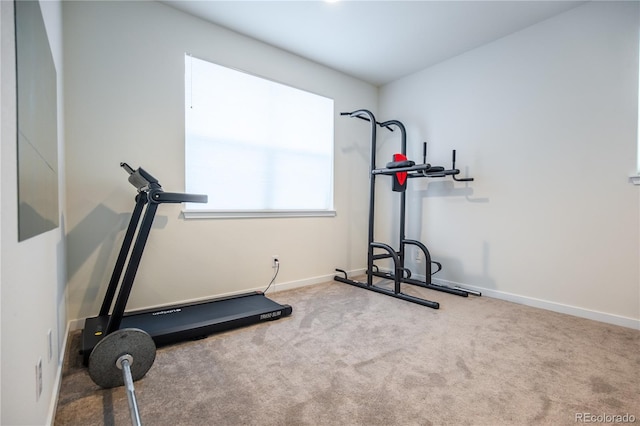 exercise area with carpet and baseboards