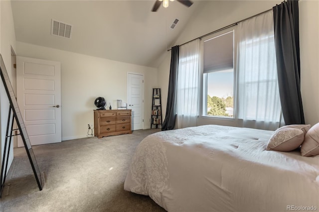 bedroom with vaulted ceiling, carpet floors, visible vents, and a ceiling fan