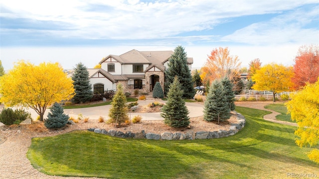 view of front of property with a front lawn