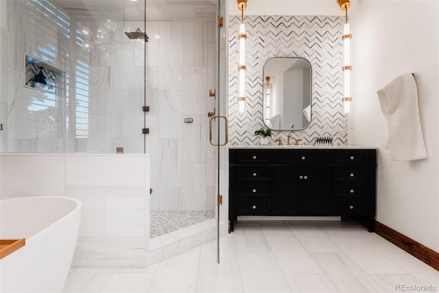 bathroom featuring vanity and shower with separate bathtub