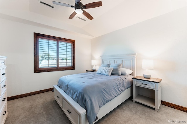 carpeted bedroom featuring vaulted ceiling and ceiling fan