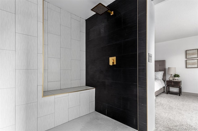 bathroom featuring tiled shower