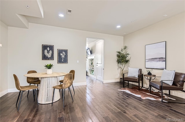 2700 E Louisiana Ave Unit 203, Denver, CO 80210 - dining room featuring dark wood-style floors, baseboards, and recessed lighting