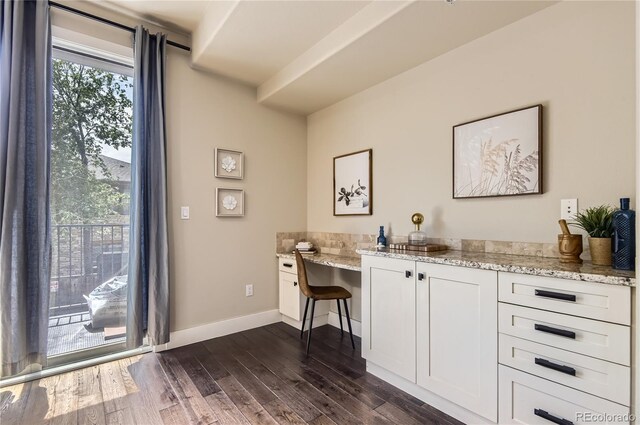 2700 E Louisiana Ave Unit 203, Denver, CO 80210 - office space featuring dark wood-style floors and baseboards