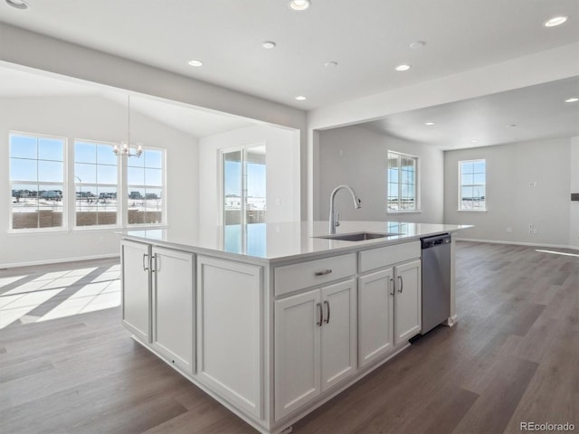 kitchen with white cabinetry, a kitchen island with sink, sink, and stainless steel dishwasher