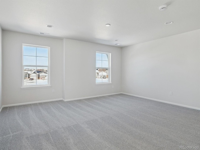 view of carpeted spare room