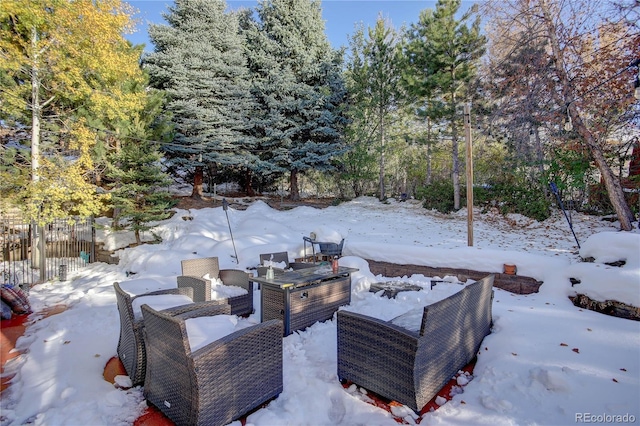 view of snow covered patio