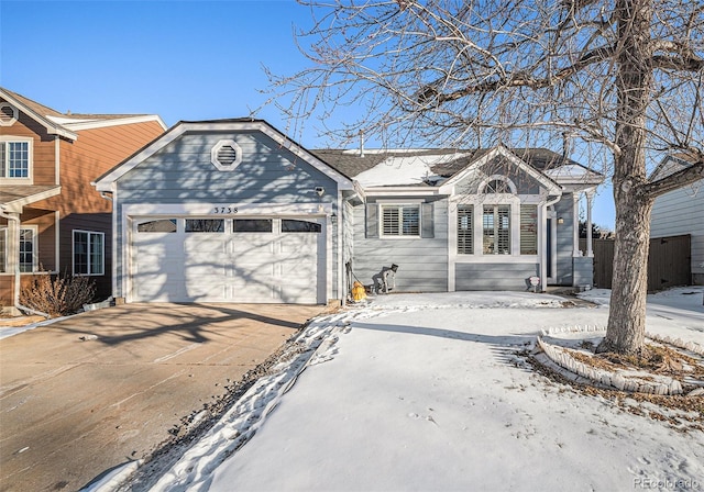 single story home featuring a garage