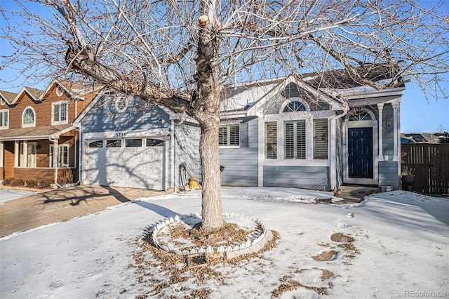 front of property with a garage