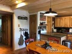81 Gcr 461, Grand Lake, CO 80447 - dining room featuring wooden ceiling and dark wood-style floors
