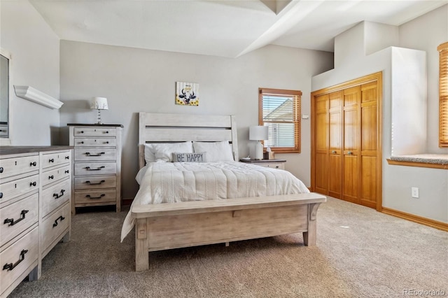 carpeted bedroom with a closet