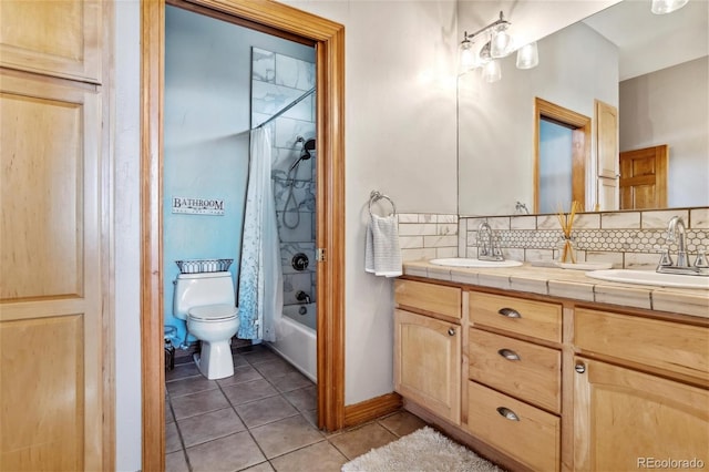 full bathroom featuring tile patterned flooring, vanity, shower / bath combination with curtain, decorative backsplash, and toilet