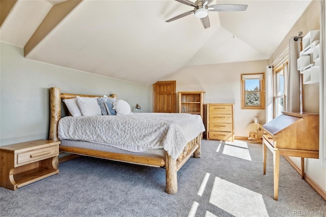 bedroom featuring vaulted ceiling, ceiling fan, and carpet flooring