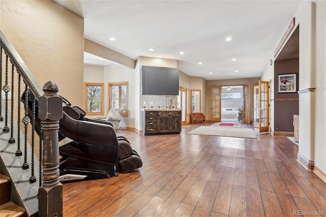 interior space with wood-type flooring and french doors