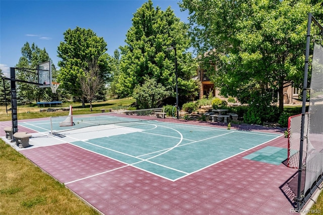 view of sport court featuring tennis court