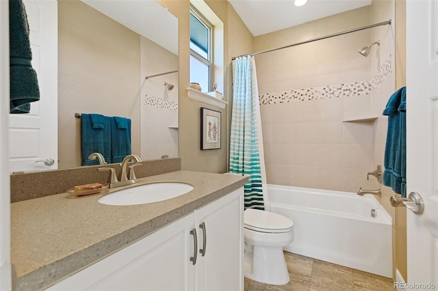 bathroom featuring shower / bath combination with curtain, vanity, and toilet