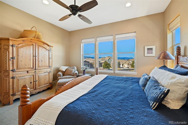 bedroom with carpet, a ceiling fan, and recessed lighting