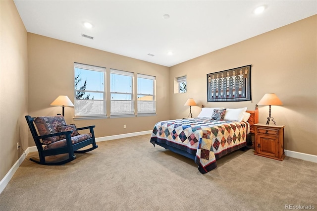 bedroom featuring light carpet, baseboards, visible vents, and recessed lighting