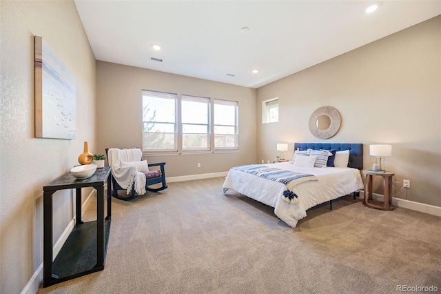 bedroom featuring baseboards, recessed lighting, carpet, and visible vents