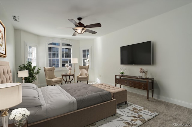 carpeted bedroom with ceiling fan