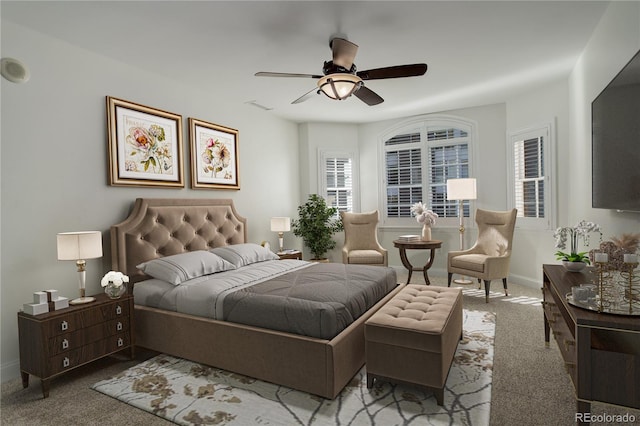 carpeted bedroom featuring ceiling fan