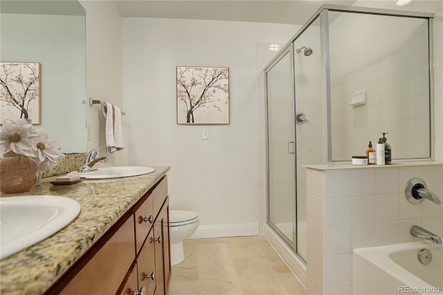 full bathroom with toilet, vanity, and shower with separate bathtub