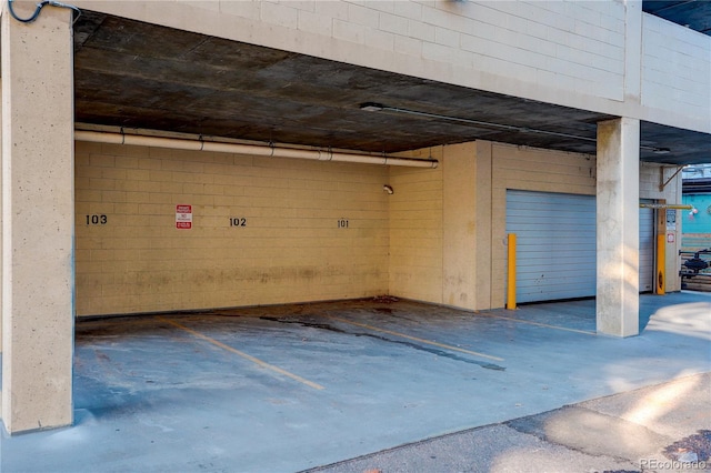 garage featuring a carport