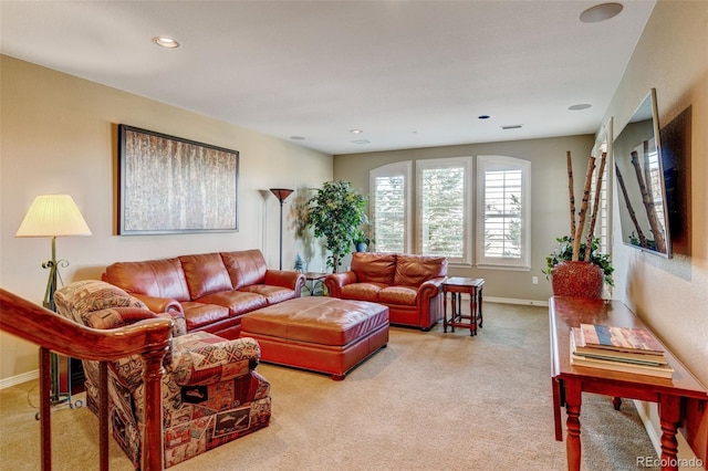 living room featuring light colored carpet