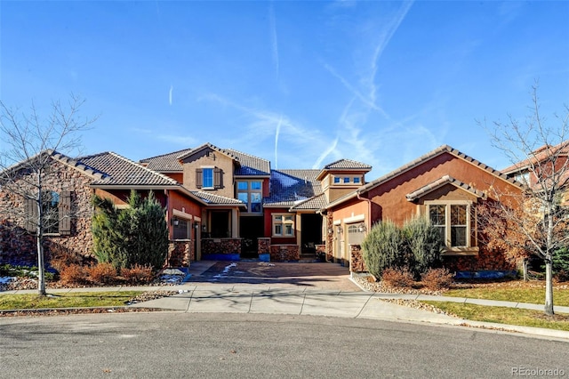 view of front of property featuring a garage