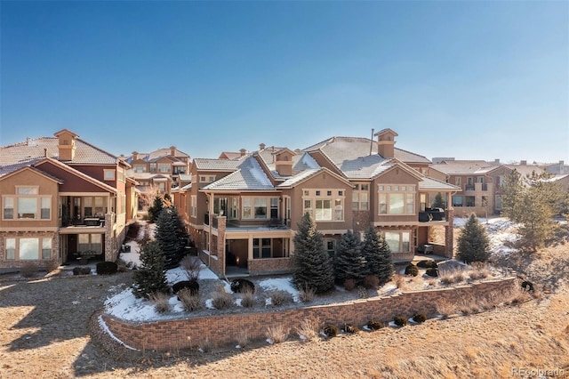view of property with a residential view