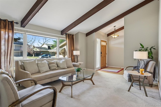 living area featuring baseboards, light carpet, and vaulted ceiling with beams