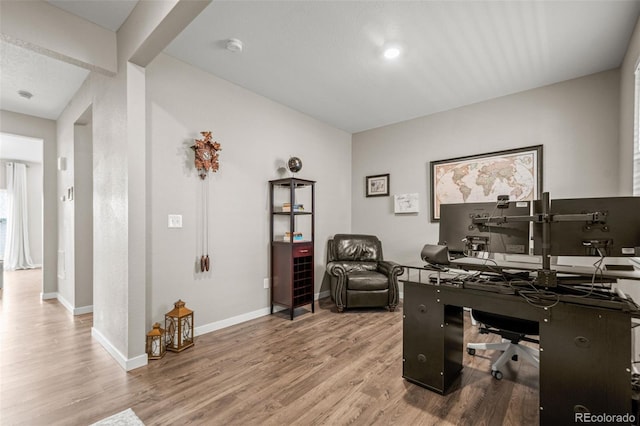 14075 Scarlet Sage St, Parker, CO 80134 - office area featuring wood finished floors and baseboards
