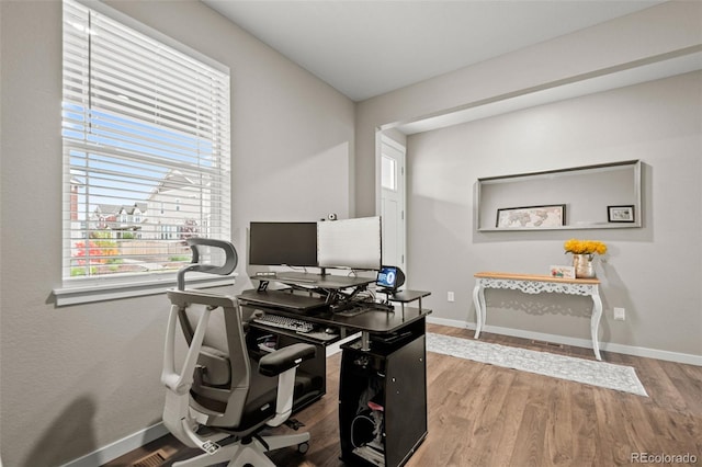 14075 Scarlet Sage St, Parker, CO 80134 - office featuring baseboards and wood finished floors