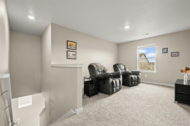 14075 Scarlet Sage St, Parker, CO 80134 - living area with carpet floors, baseboards, and recessed lighting