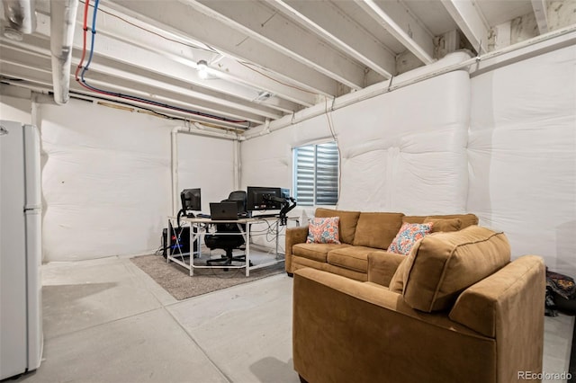 14075 Scarlet Sage St, Parker, CO 80134 - unfinished basement with freestanding refrigerator and a desk