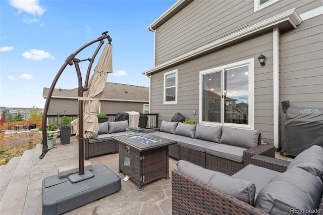 14075 Scarlet Sage St, Parker, CO 80134 - view of patio with an outdoor living space with a fire pit and fence