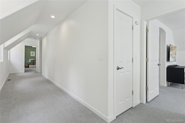 4978 Camel Heights Rd, Evergreen, CO 80439 - hallway featuring light carpet, recessed lighting, and arched walkways