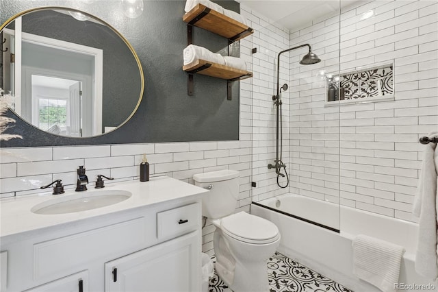4978 Camel Heights Rd, Evergreen, CO 80439 - bathroom with vanity, tub / shower combination, tile walls, and tile patterned floors