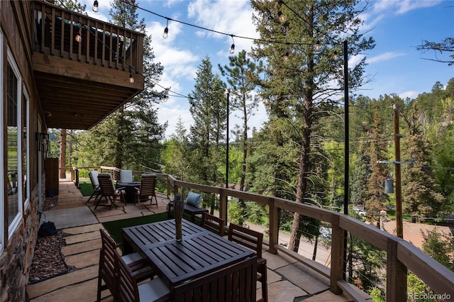 4978 Camel Heights Rd, Evergreen, CO 80439 - wooden deck featuring outdoor dining area