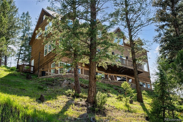 4978 Camel Heights Rd, Evergreen, CO 80439 - back of property with a wooden deck