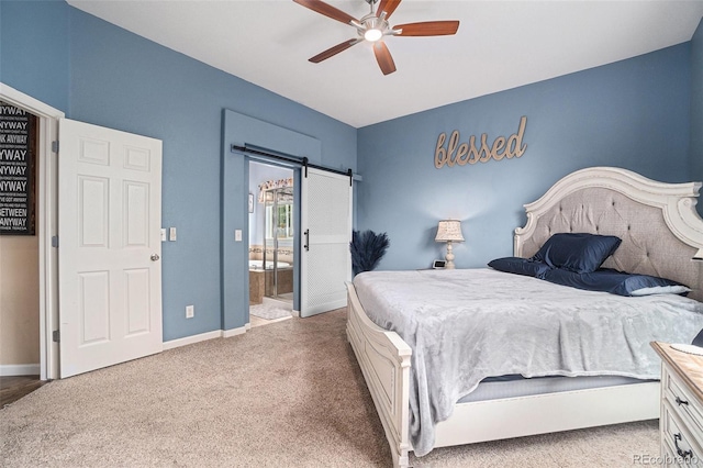 2726 Aylesbury Way, Johnstown, CO 80534 - carpeted bedroom featuring a barn door, baseboards, ensuite bathroom, and ceiling fan