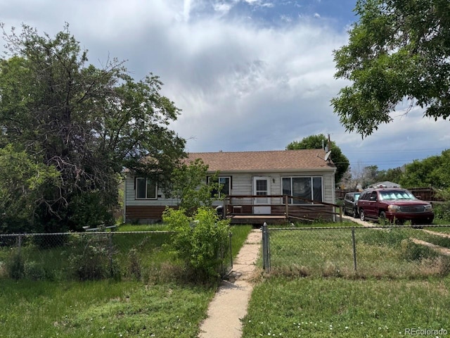 1105 S Raleigh St, Denver, CO 80219 - ranch-style home featuring a fenced front yard