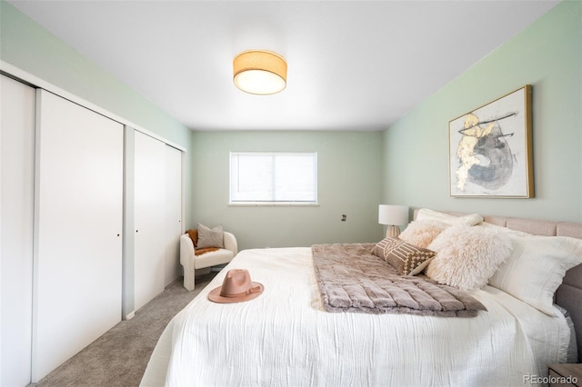 bedroom with carpet floors and a closet