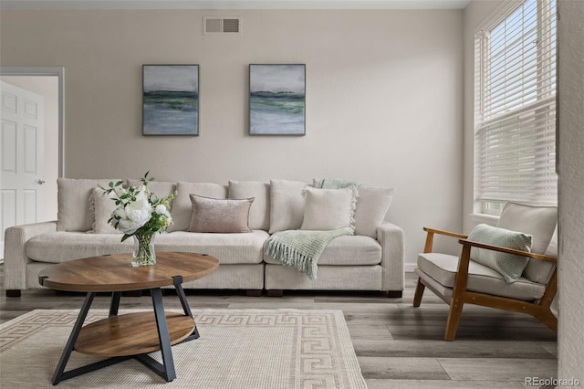 7440 S Blackhawk St Unit 2-108, Englewood, CO 80112 - living room featuring wood finished floors