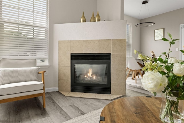 7440 S Blackhawk St Unit 2-108, Englewood, CO 80112 - detailed view of a tile fireplace and wood finished floors