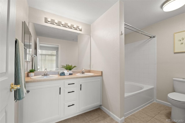 7440 S Blackhawk St Unit 2-108, Englewood, CO 80112 - full bath featuring double vanity, washtub / shower combination, and tile patterned floors