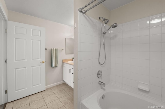 7440 S Blackhawk St Unit 2-108, Englewood, CO 80112 - bathroom featuring vanity, washtub / shower combination, and tile patterned floors