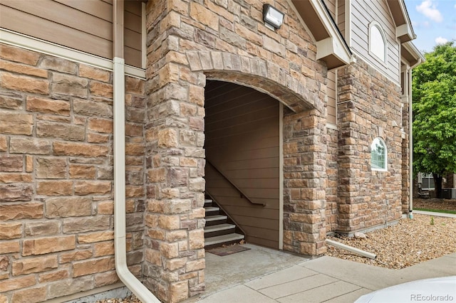 7440 S Blackhawk St Unit 2-108, Englewood, CO 80112 - property entrance featuring stone siding