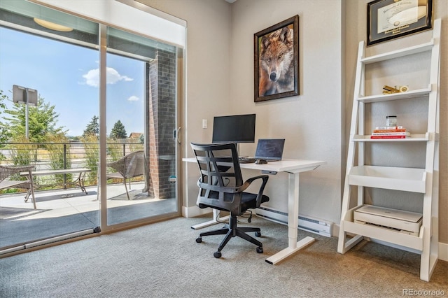 carpeted office featuring a baseboard radiator